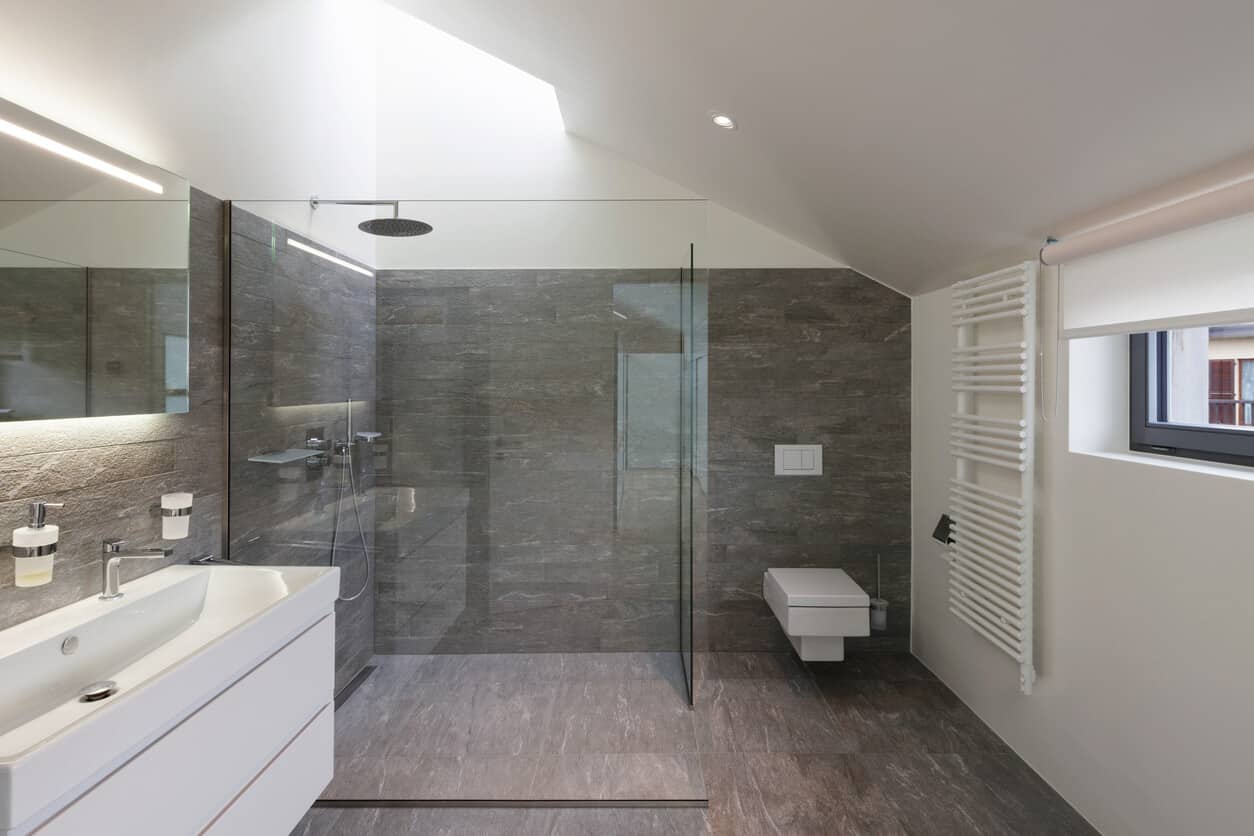 https://www.woodbridgeshowerandbath.com/wp-content/uploads/2022/01/stone-walk-in-shower-remodel.jpeg